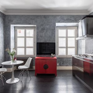 Iflat A Sparkle Of Red In Trastevere