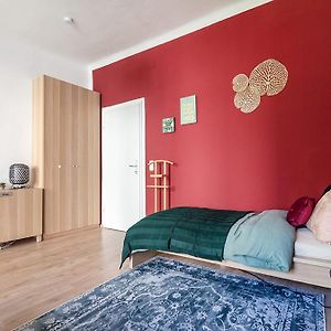 Colorful Apartment Facing Green Courtyard