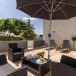 Three-Bedroom Ground Floor Apartment