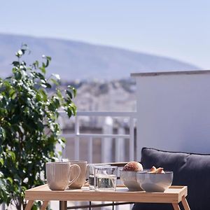 A Sunkissed Retreat Under The Acropolis