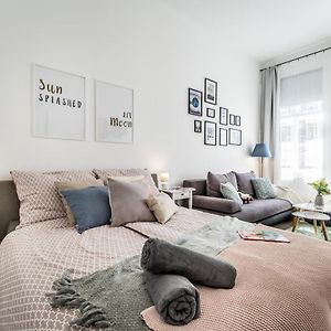 Sun-Splashed Retreat In The Heart Of A Vibrant Quarter