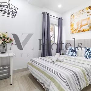 Ayz Elcano - Auto Check-In Property