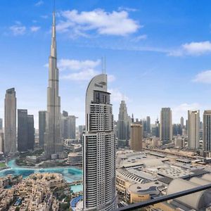 Exclusive 4 Bedroom Apartment I Burj Khalifa And Fountain Views I Free Wi-Fi, Pool, Gym & Parking I By Meerak
