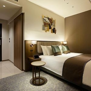 Chambre Accessible aux Personnes à Mobilité Réduite Lit Queen-Size