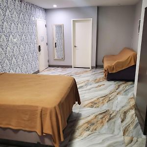 Chambre Lit King-Size avec Accès aux Personnes Handicapées
