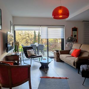 Appartement avec terrasse, jardin et double garage