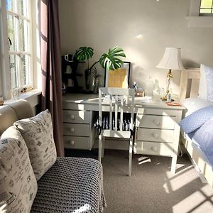 Spacious And Sunny Master Bedroom With Shared Bathrooms