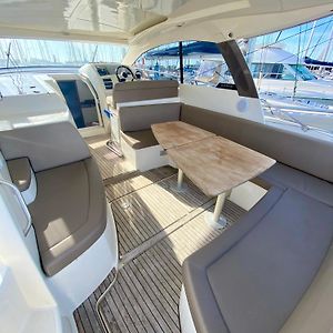 Family On Boat Cabin