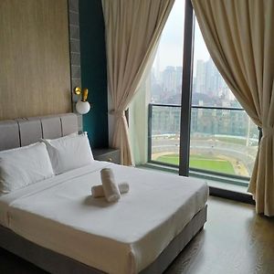 Appartement à 3 Chambres à Coucher aux Étages Supérieurs