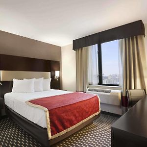 Chambre Lit Queen-Size avec Accès aux Personnes Handicapées