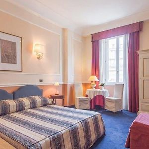 Chambre Exécutive Lit Queen-Size