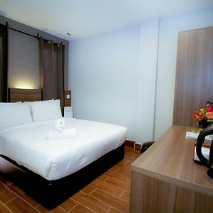 Chambre Exécutive Lit Queen-Size